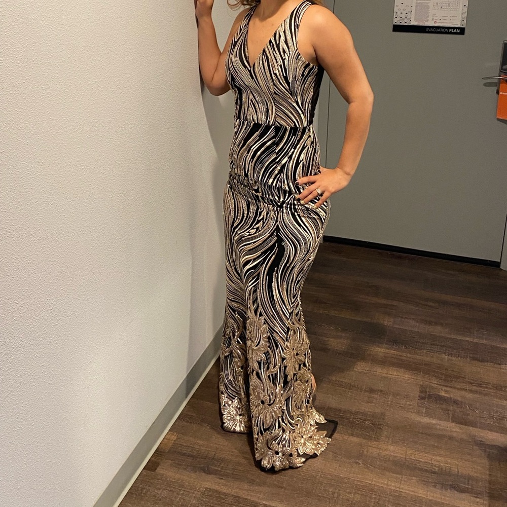 Black and gold sequined evening gown